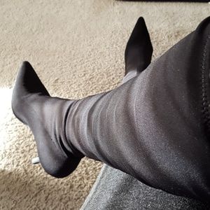 Black Knee high boots with a 3 inch heel